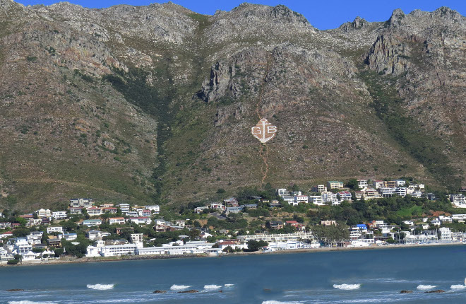 Gordons Bay with the GB and anchor on the Hottentots-Holland Mountain range