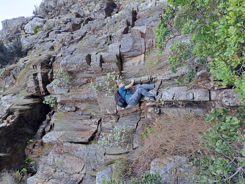 Scrambling to cave on St James Peak