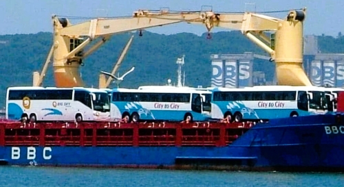 Two City to City coaches and one Big Sky Intercity coach on a ship at Durban Harbour. 