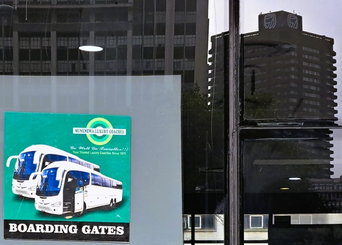 Munenzwa sign for its boarding gate at Cape Town bus station