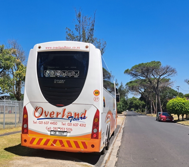 Overland Tours bus parked next to Pinelands High School