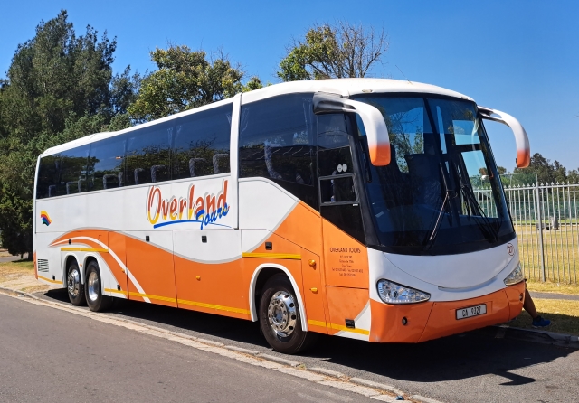 Overland Tours bus parked outside Pinelands High School