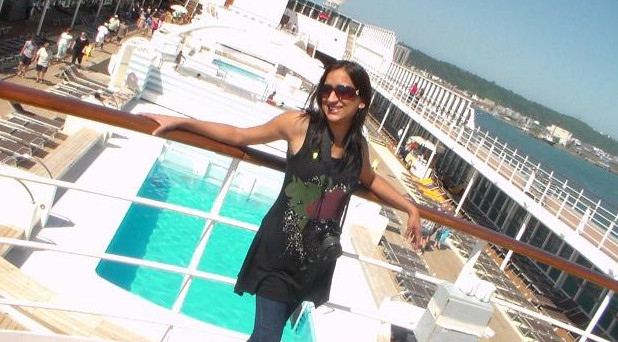 posing in front of the pool on the MSC Sinfonia cruise ship