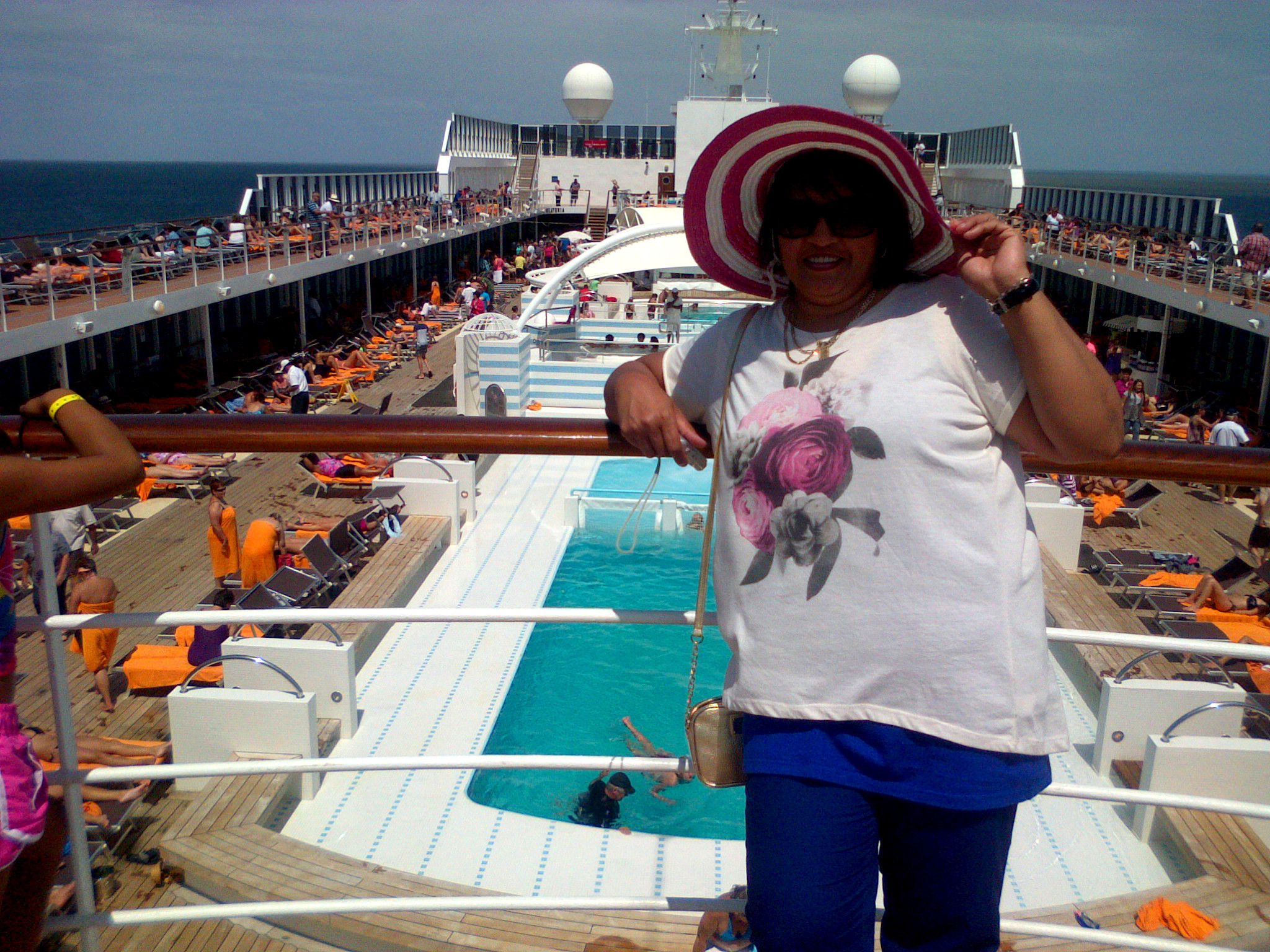 Fairouza posing on the deck of the MSC Sinfonia cruise ship