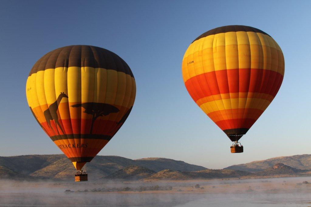 Hot air balloons above the Pilanesberg National Park